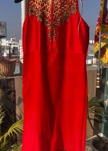 Red Embroidered Sleeveless Kurta.