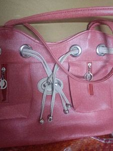 Stylish Pink Handbag with Drawstring Detail