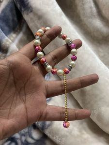 pink Beaded Bracelet with Charm
