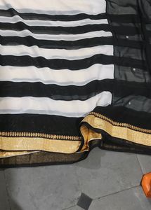 Designer Black And White Saree With Golden Border