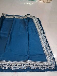 Elegant Teal Saree with Silver Embroidery