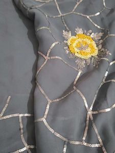Elegant Grey Saree with Silver Details
