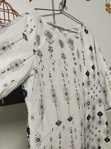White short kurti, Breast size 34 to 36 waist size 32 to 34 hips 36 to 38
