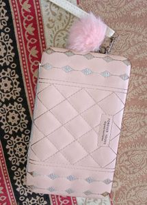 Quilted Pink Clutch with Pom Po