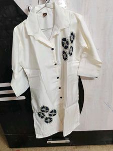 Elegant White Kurta with Blue Embellishments