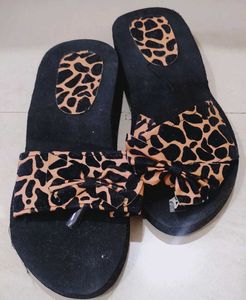 Animal Print Bow Flip Flops never used...