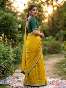 Beautiful Yellow fancy Saree with green blouse