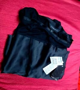 Cosmo&amp;Co. Satin Black Top