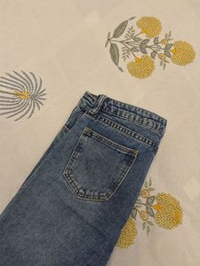 Distressed Blue Denim Jeans