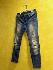 Distressed Blue Jeans with Paint Splatter