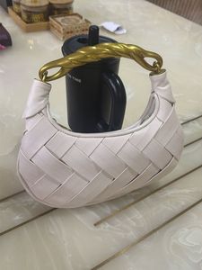 Chic Woven Handbag with Gold Handle