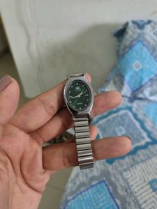 Elegant Oval Green Dial Watch