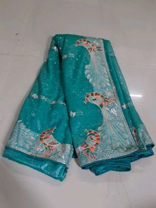 Stunning Teal Embroidered Peacock Saree