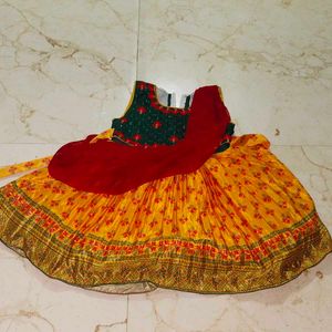 Vibrant Yellow & Red Embroidered Lehenga Choli