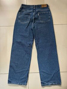 Distressed Blue Denim Jeans
