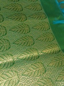 Elegant Green Saree with Gold Leaf Motifs