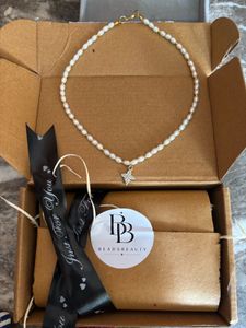 Elegant Pearl Necklace with Diamond Pendant
