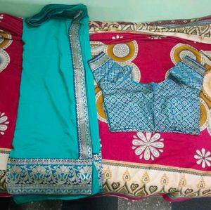 Elegant Teal Saree with Golden Border