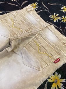 Stylish Beige Jeans with Graphic Print