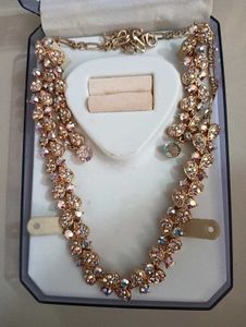 orange necklace with earning