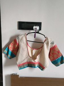 Elegant Cream Saree with Vibrant Border