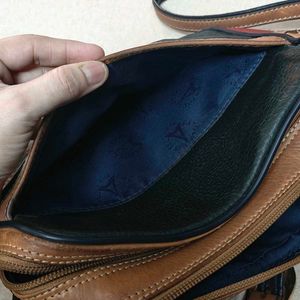 100% leather alfred snug crossbody bag