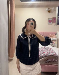 Peter Pan collar windowpane grid blouse.
