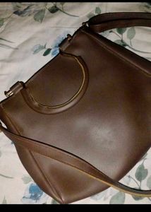Stylish Brown Handbag with Charm