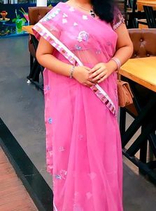Elegant Pink Saree with Delicate Details