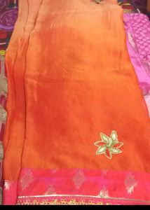 Vibrant Orange Saree with Pink Border
