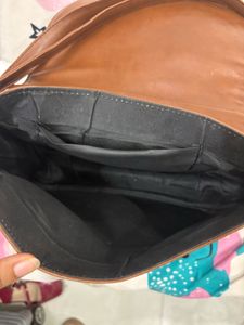 Brown sling bag
