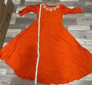 women solid anarkali kurta