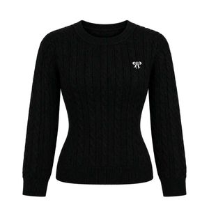 Chic Black Cable Knit Sweater with Bow Detail