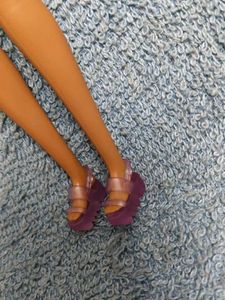 Stylish Barbie Doll in Purple Snake Print Dress