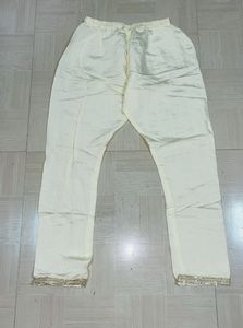 Embroidered Cream Silk Straight Kurta Pant Set.