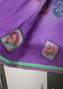 Elegant Purple Saree with Floral Border
