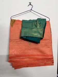 Orange Saree with Teal Blouse