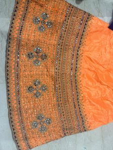 Orange Lehenga Choli with Blue Dupatta