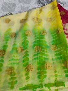 Vibrant Tie-Dye Saree with Gold Accents❤️💛💚🤍