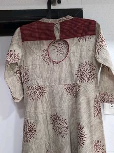 Elegant Beige Kurta with Starburst Print