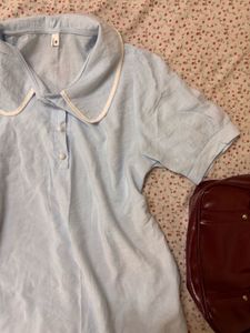 Blue top with White Trim