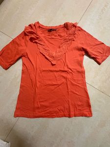 Orange Ruffle Neck Top