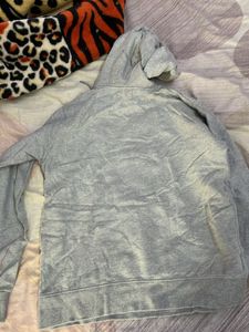 a grey sweatshirt