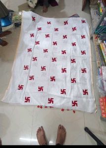 White saree with Red Swastik Print
