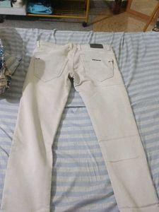 Cream Straight Leg Jeans