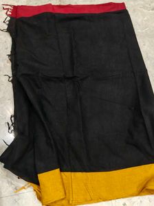 Elegant Black Saree with Golden Border