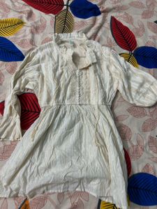 Elegant White Kurta with Metallic Stripes