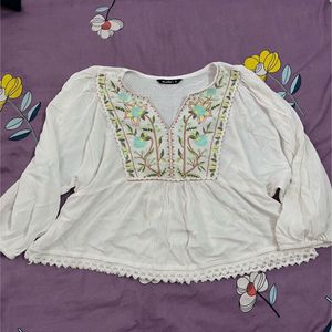 Embroidered White Peplum Top