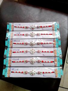 Silver Polish Designer Rakhi ( 6 Pec)