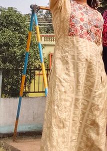 Elegant Cream Kurta with Colorful Neckline